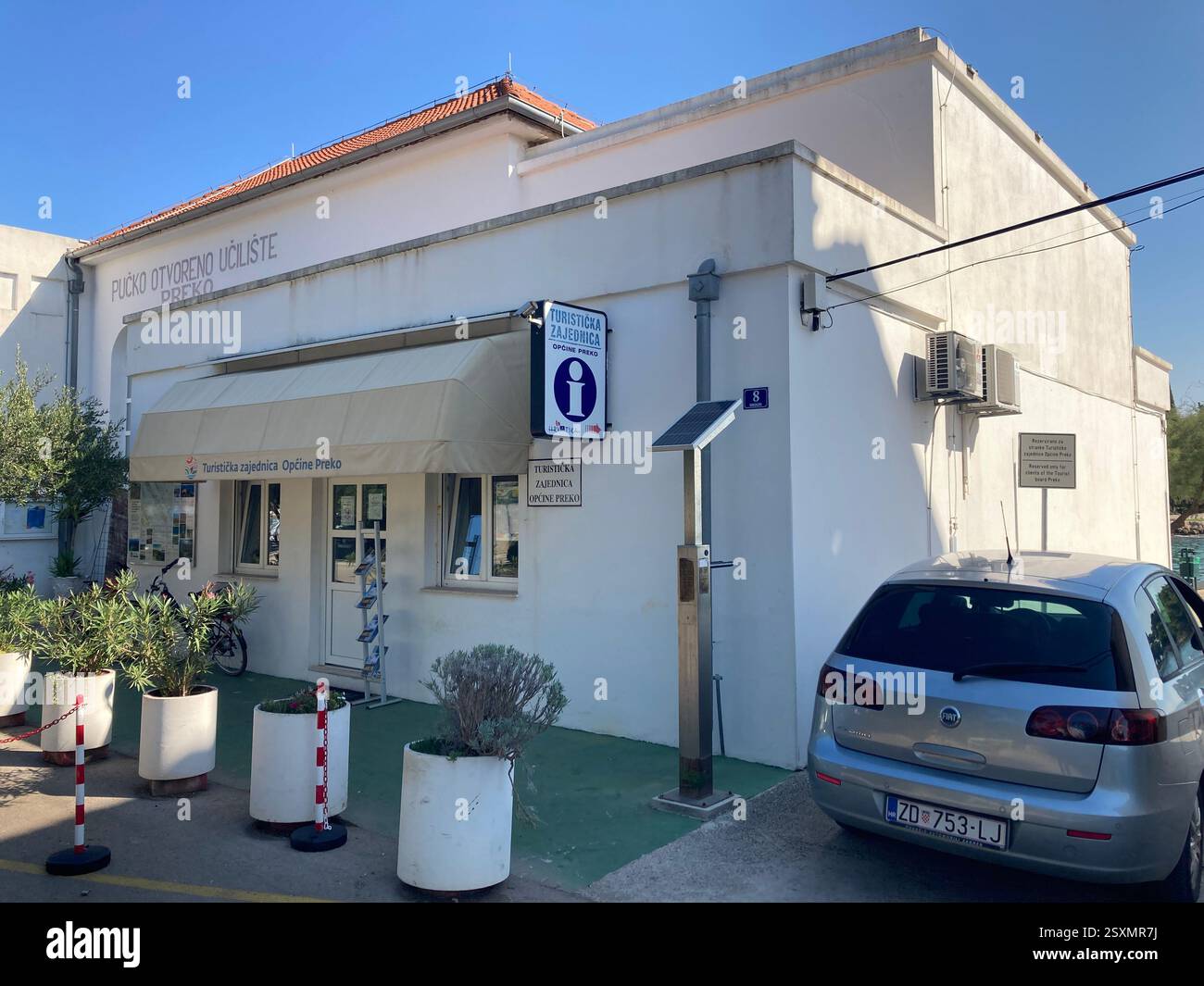 Tourist Information building office on Ugljan Island near Zadar, Croatia. Holiday information and touristic info - Smartphone Captured Stock Image