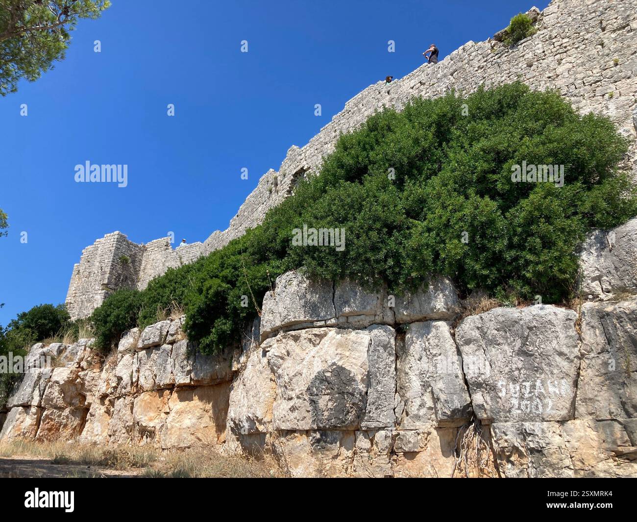 Fort Saint Michael ruin 6th-century hill fort, observation post. Byzantine era. Ugljan Island, Croatia. Ancient military stone castle destroyed - Smartphone Captured Stock Image