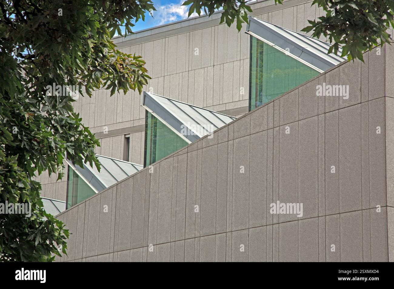 Modern architectural detail with geometric skylights and clean lines in ...