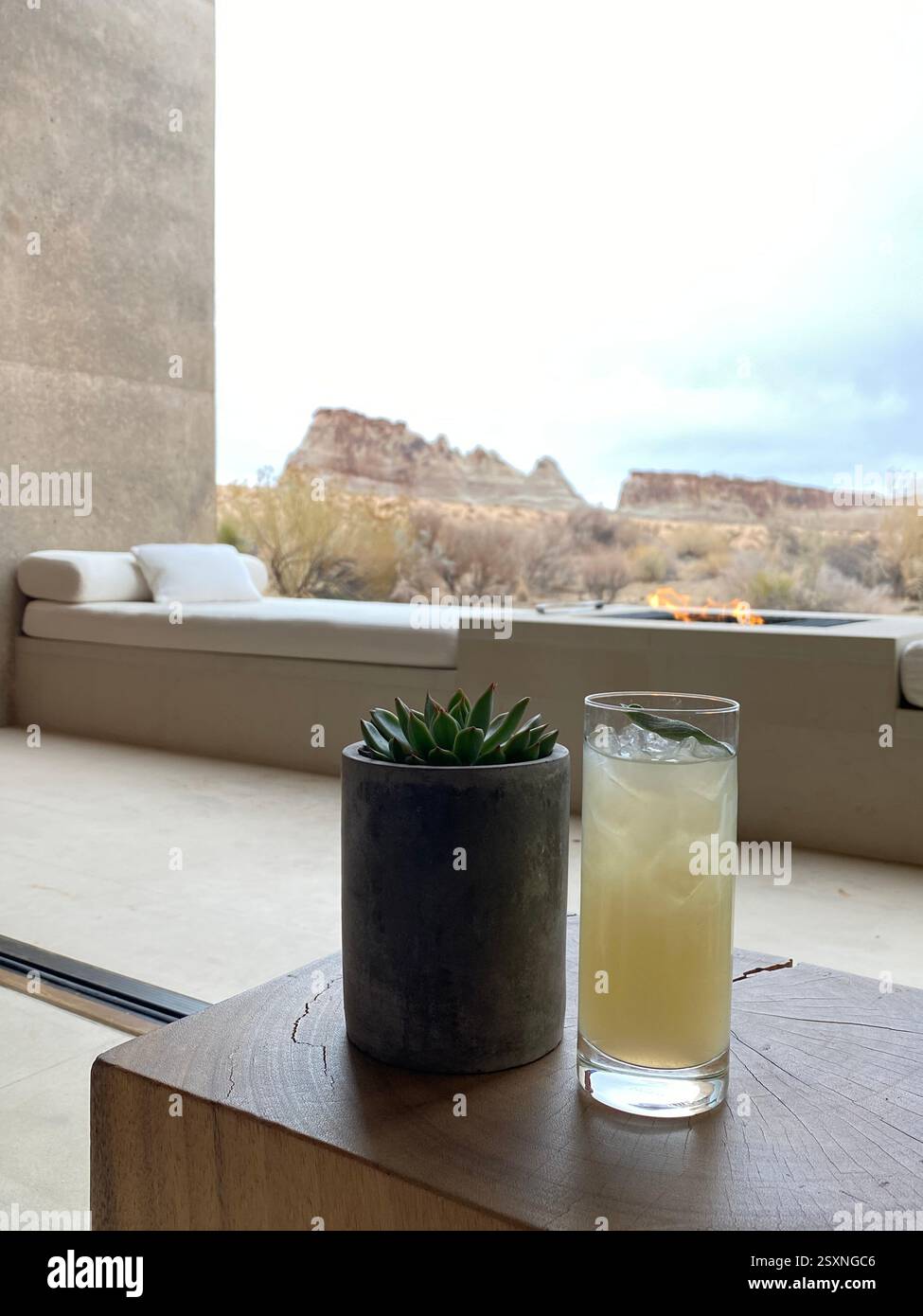 Minimalist Desert Retreat with Refreshing Drink - Smartphone Captured Stock Image