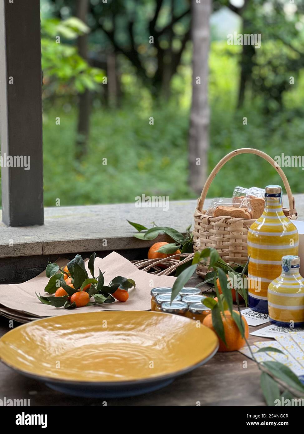 Rustic Outdoor Table with Citrus and Mediterranean Decor - Smartphone Captured Stock Image