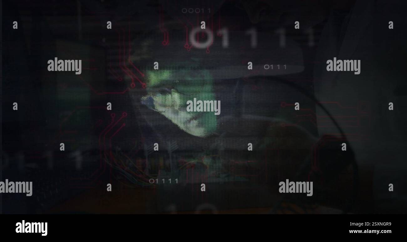 Binary code and circuit image over person working on computer Stock Photo