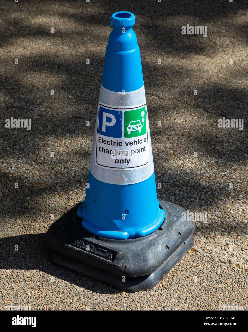 Cone Point Fixing A cone marking the location of an Electric Vehicle Charging Point in ...