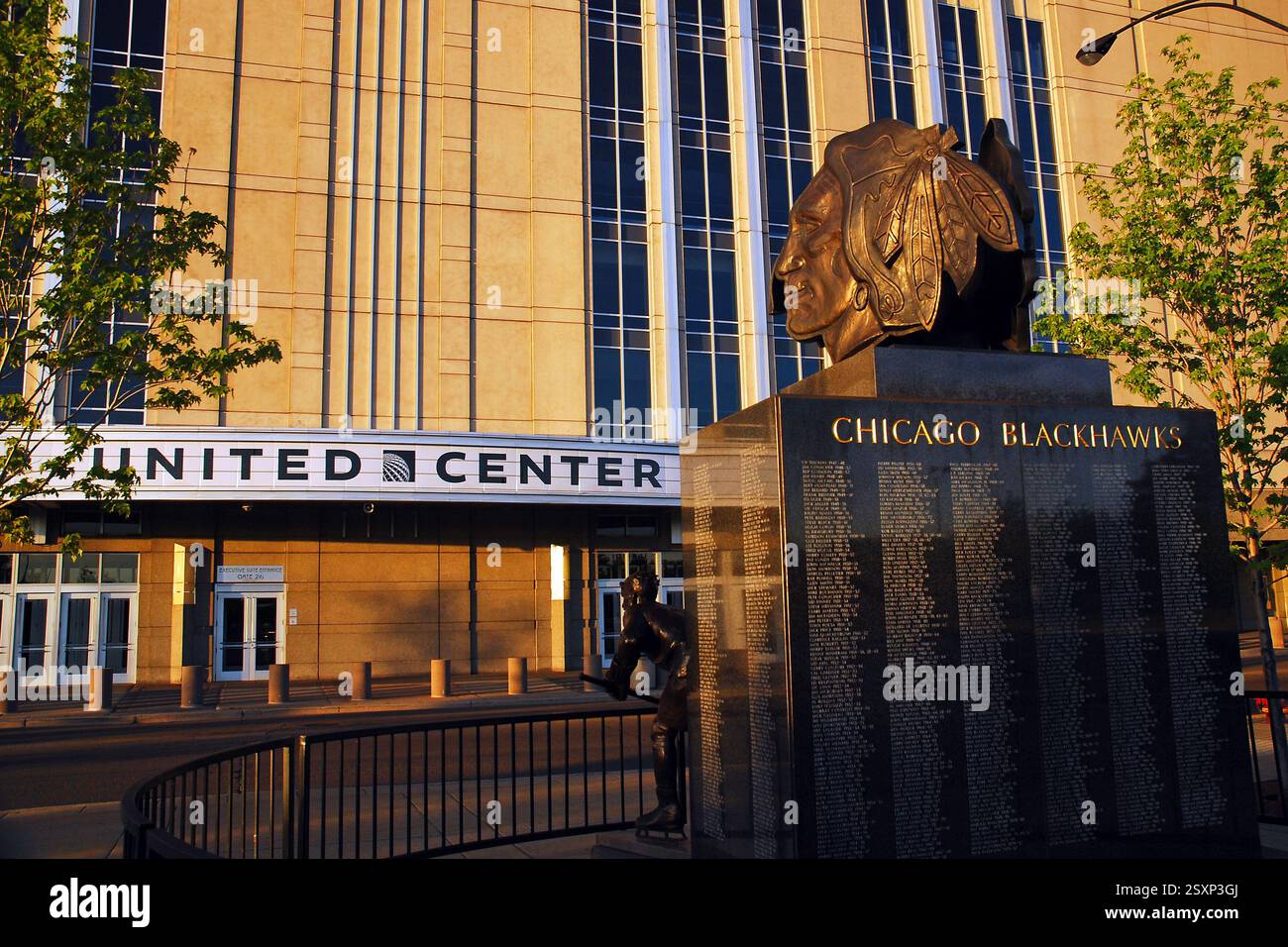 A large sculpture of the hockey Chicago Blackhawks stands outside of the United Center and lists the names of players who wore the jersey Stock Photo