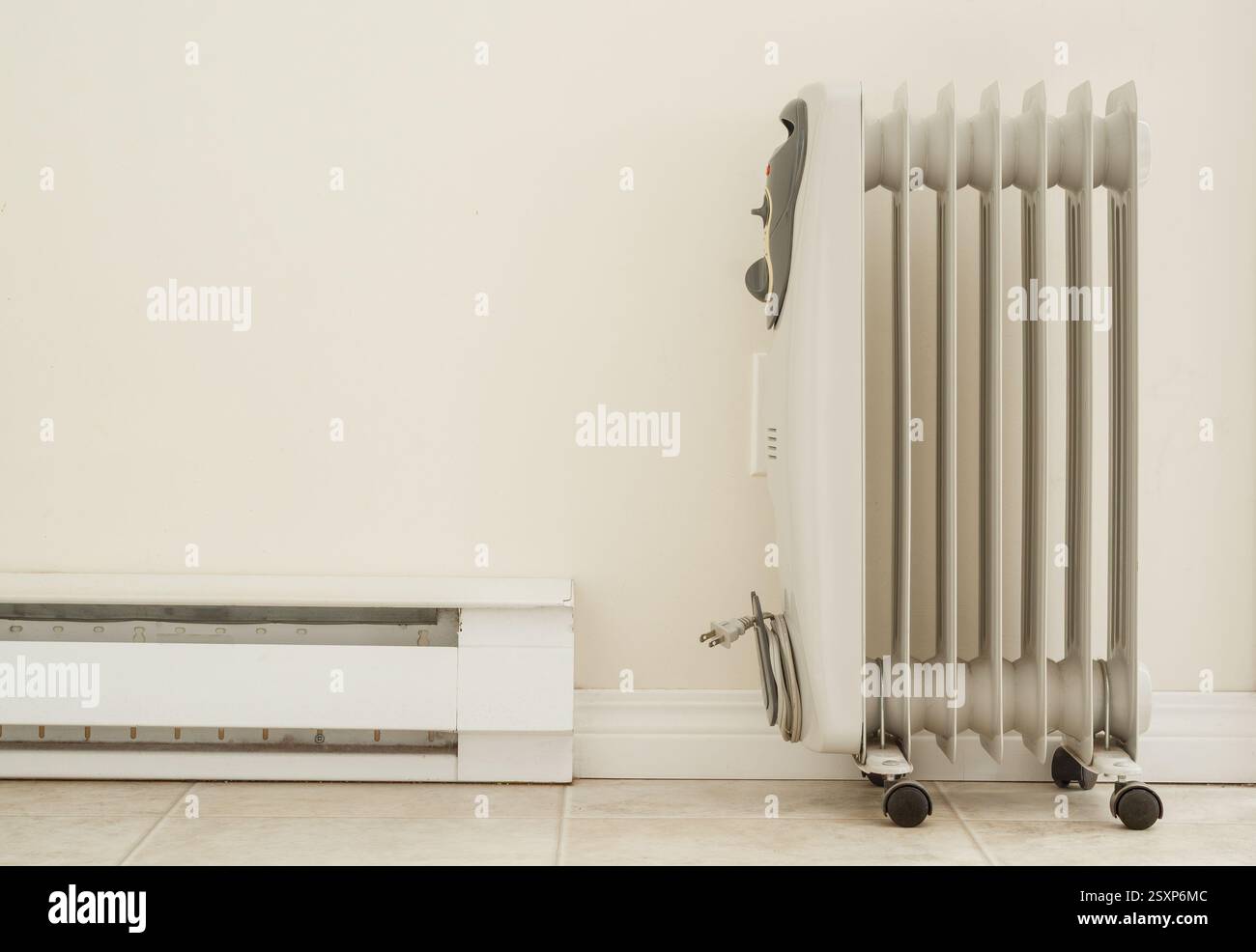 portable-electric-heater-and-baseboard-stock-photo-alamy
