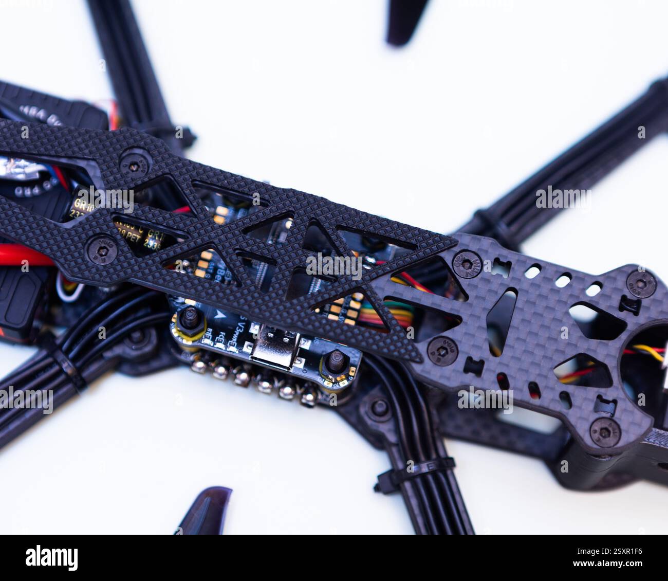 FPV drone in production on white background. Stock Photo