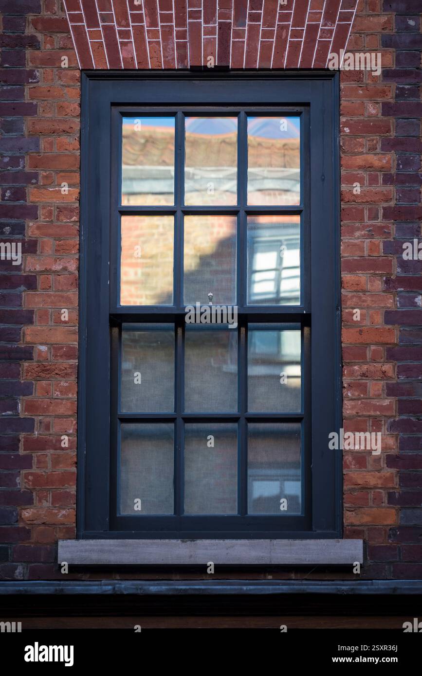 Window with reflections, East End, London, England, UK Stock Photo - Alamy