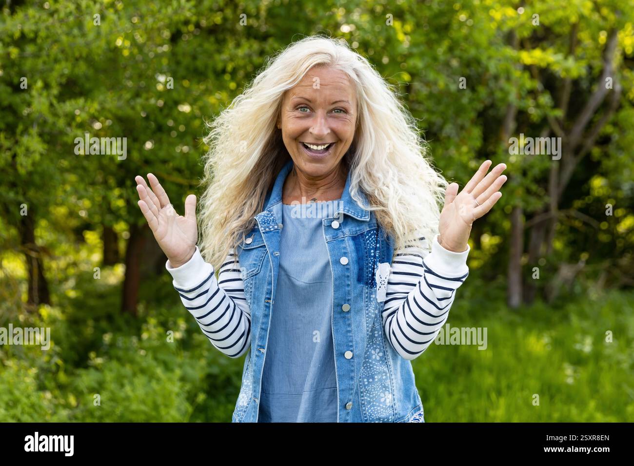 Portrait from happy caucasian woman with long hair Stock Photo - Alamy