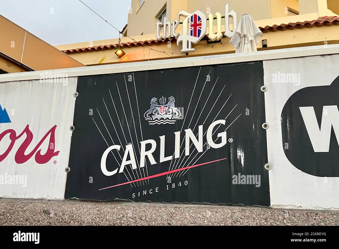 Carling Sign outside a British Pub simply called 'The Pub' in Costa Adeje. Tenerife, Canary Islands, Spain. 27th January 2025. - Smartphone Captured Stock Image