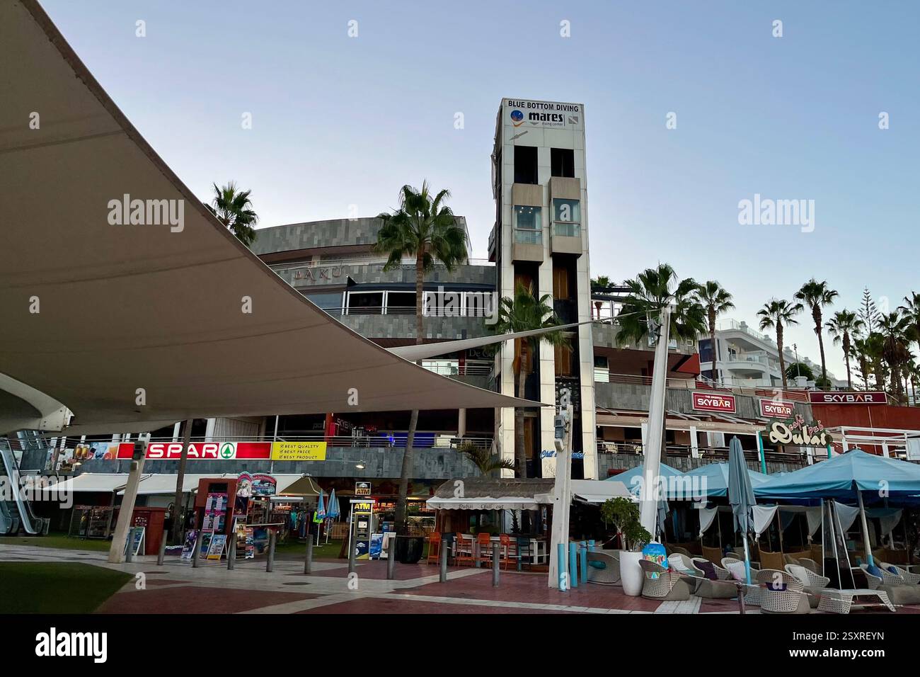 Looking towards the various, shops, restaurants, and elevator shaft of the Centro Comercial Terranova on the Costa Adeje Seafront by La Pinta Beach. - Smartphone Captured Stock Image