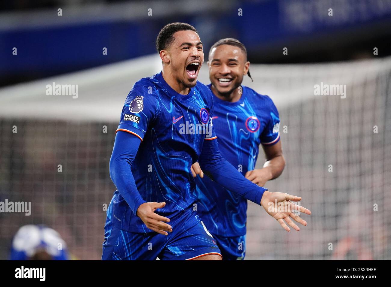 Chelsea's Levi Colwill (left) celebrates scoring their side's third ...