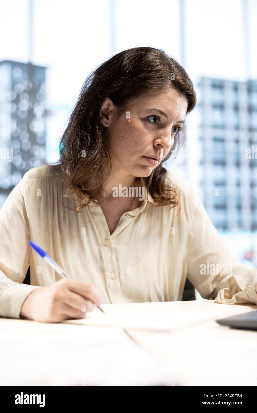 Female Ceo Solving Her Business Paperwork Tasks And Signing Documents