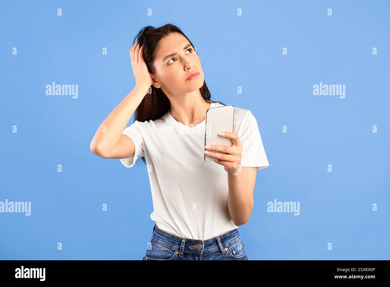 Photo young confused lady hi-res stock photography and images - Alamy