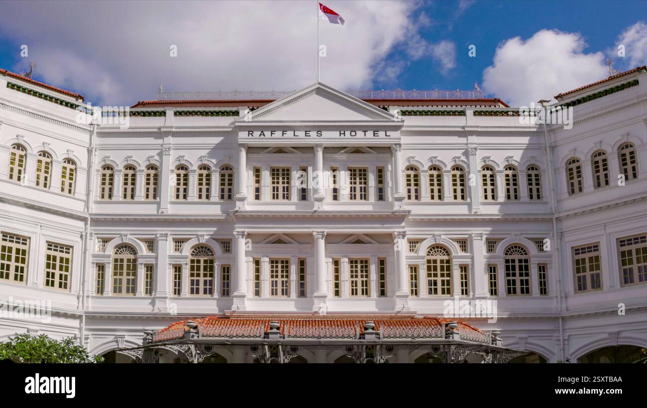 Iconic Raffles close shot of the front facade of the famous raffles hotel in singapore ...