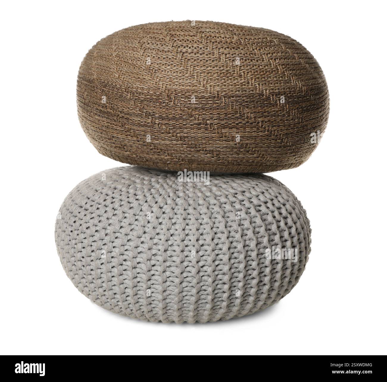 Different stylish knitted poufs on white background Stock Photo