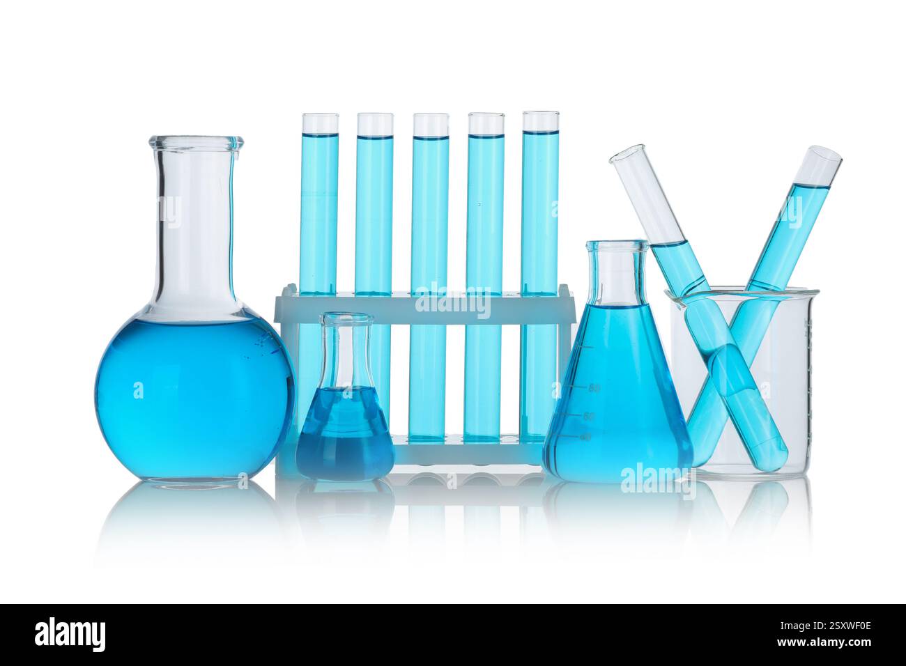 Laboratory glassware with blue liquid isolated on white Stock Photo - Alamy