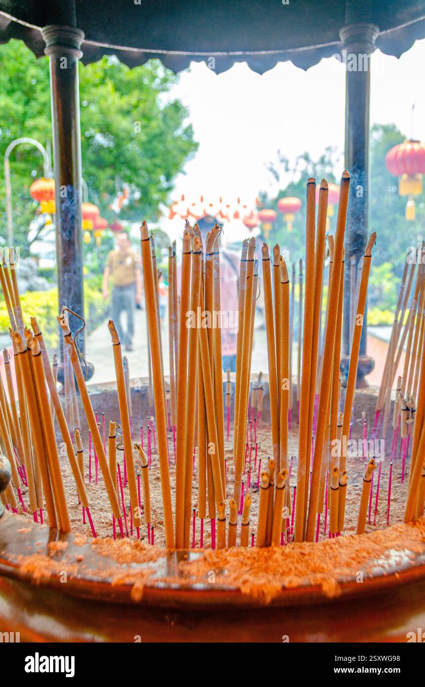 Ceremonial Incense Sticks Burning Inside a Traditional Temple Offering ...