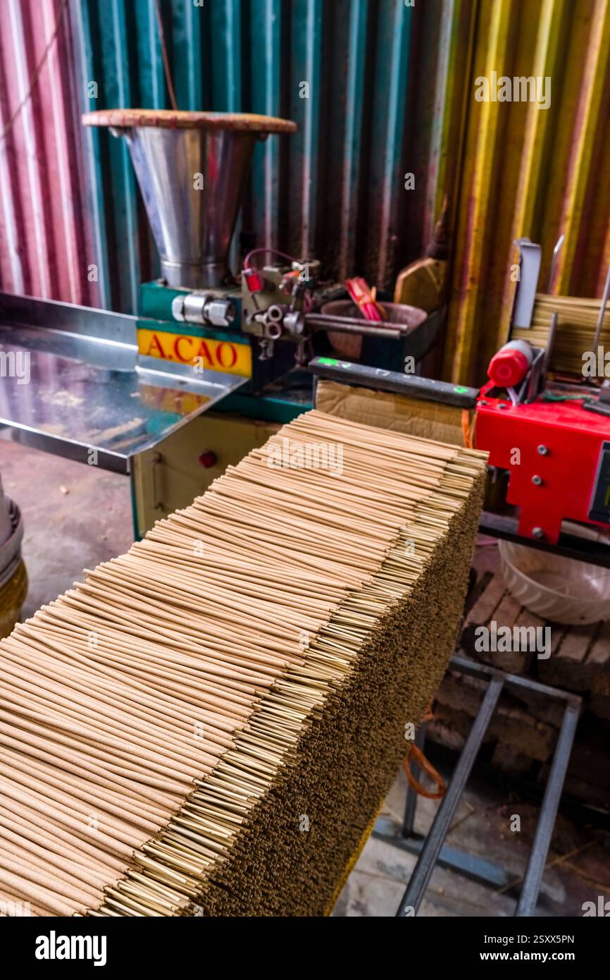 Lots of finished incense sticks on a shelf, they still need to be bundled. Stock Photo