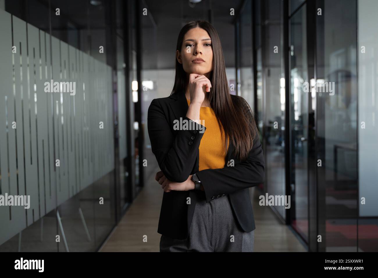 Businesswoman in black blazer hi-res stock photography and images - Alamy