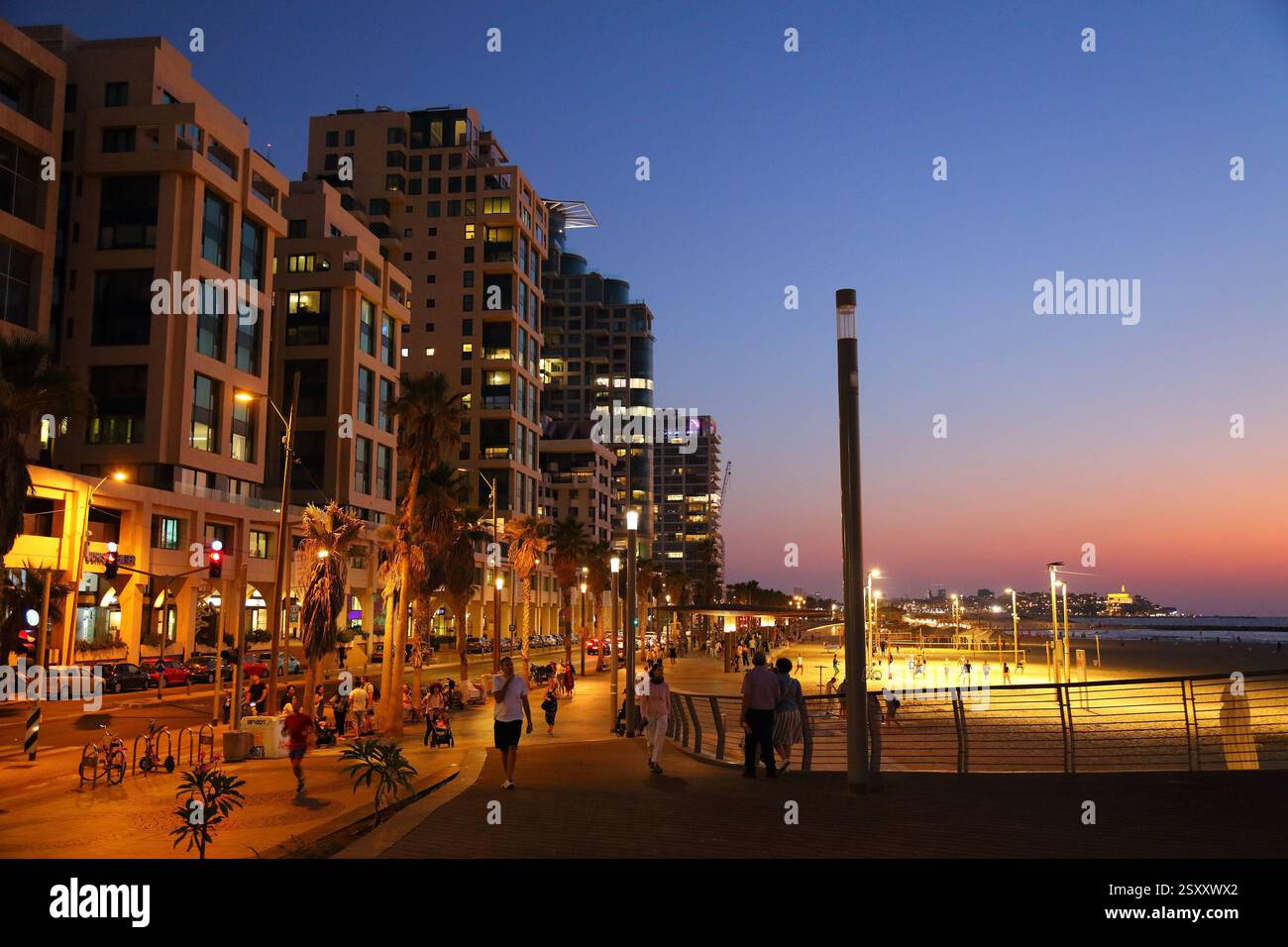 TEL AVIV, ISRAEL - NOVEMBER 3, 2022: People visit beachfront promenade (Tayelet) in Tel Aviv, Israel. Tel Aviv is the economic and technological cente Stock Photo