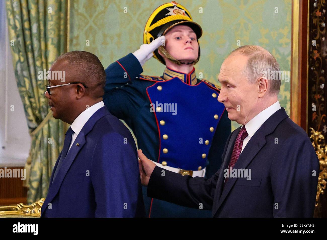 Guinea-Bissau's President Umaro Sissoco Embalo, left, and Russian