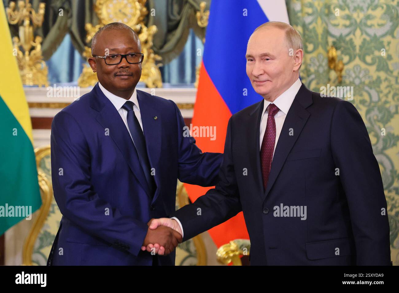 Guinea-Bissau's President Umaro Sissoco Embalo, left, and Russian