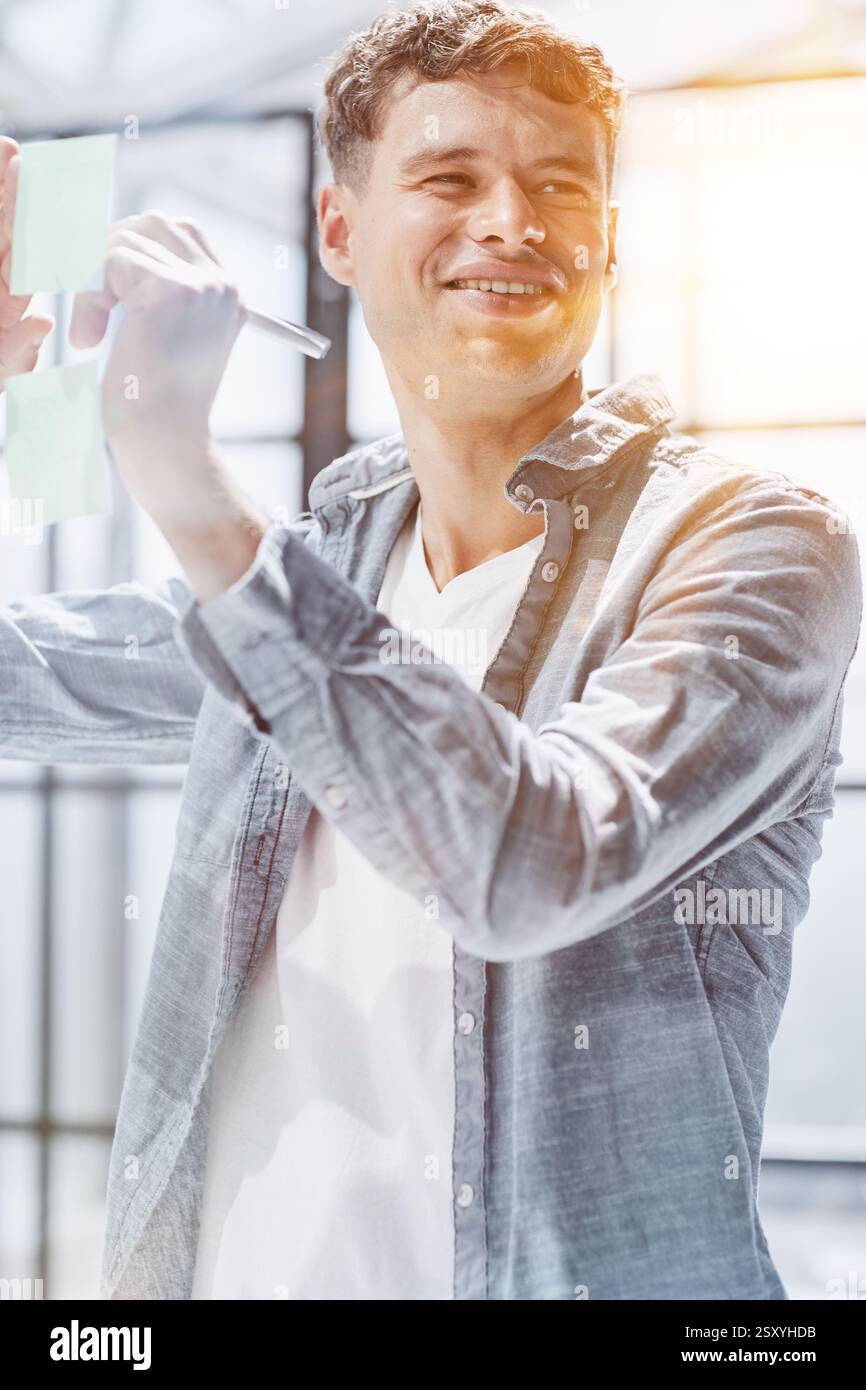 Businessman, sticky notes and work schedule for project planning Stock Photo