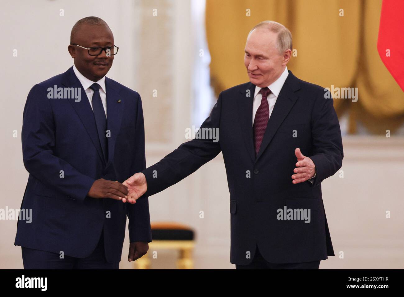 Guinea-Bissau's President Umaro Sissoco Embalo, left, and Russian