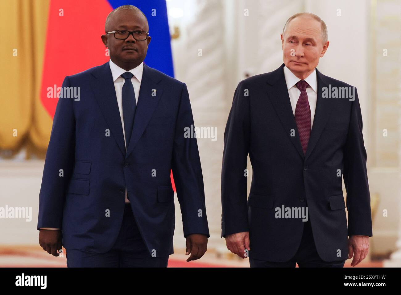 Guinea-Bissau's President Umaro Sissoco Embalo, left, and Russian