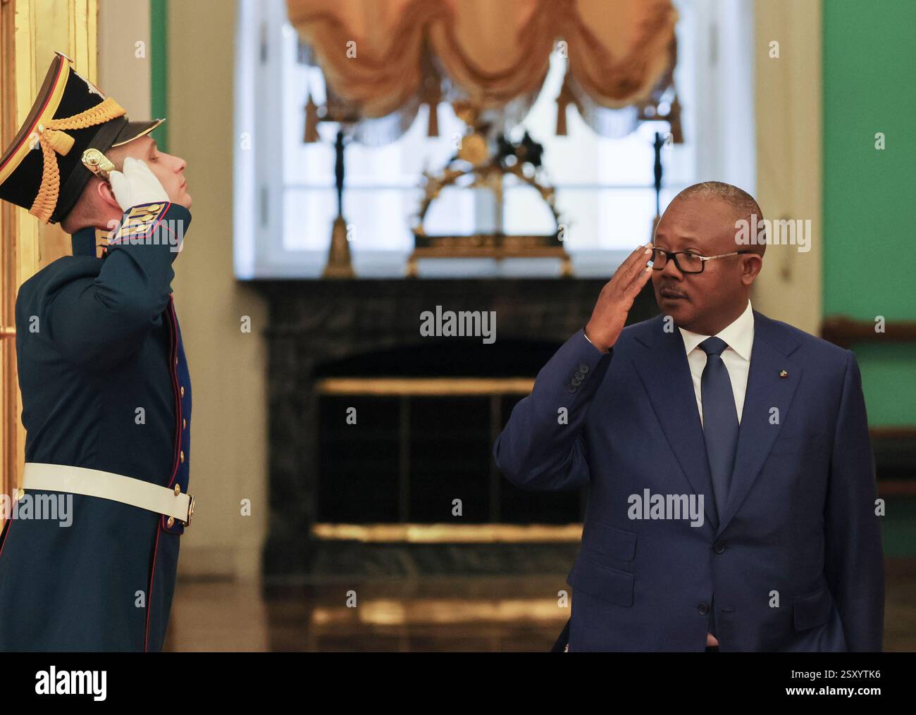 Guinea-Bissau's President Umaro Sissoco Embalo enters a hall during his