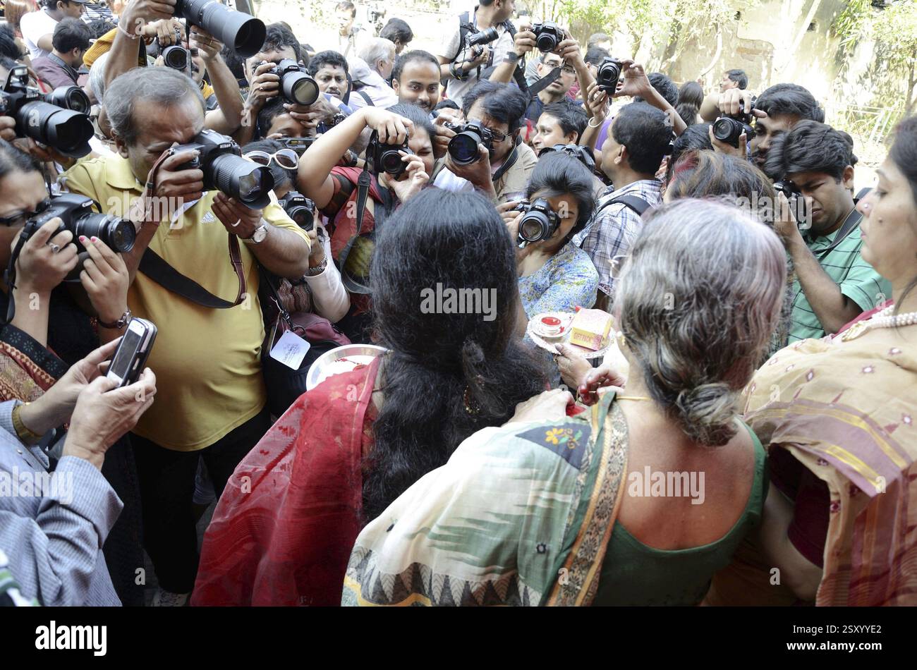 Photographers taking photos of women on occasion of Sindur Khela at Kolkata India Stock Photo