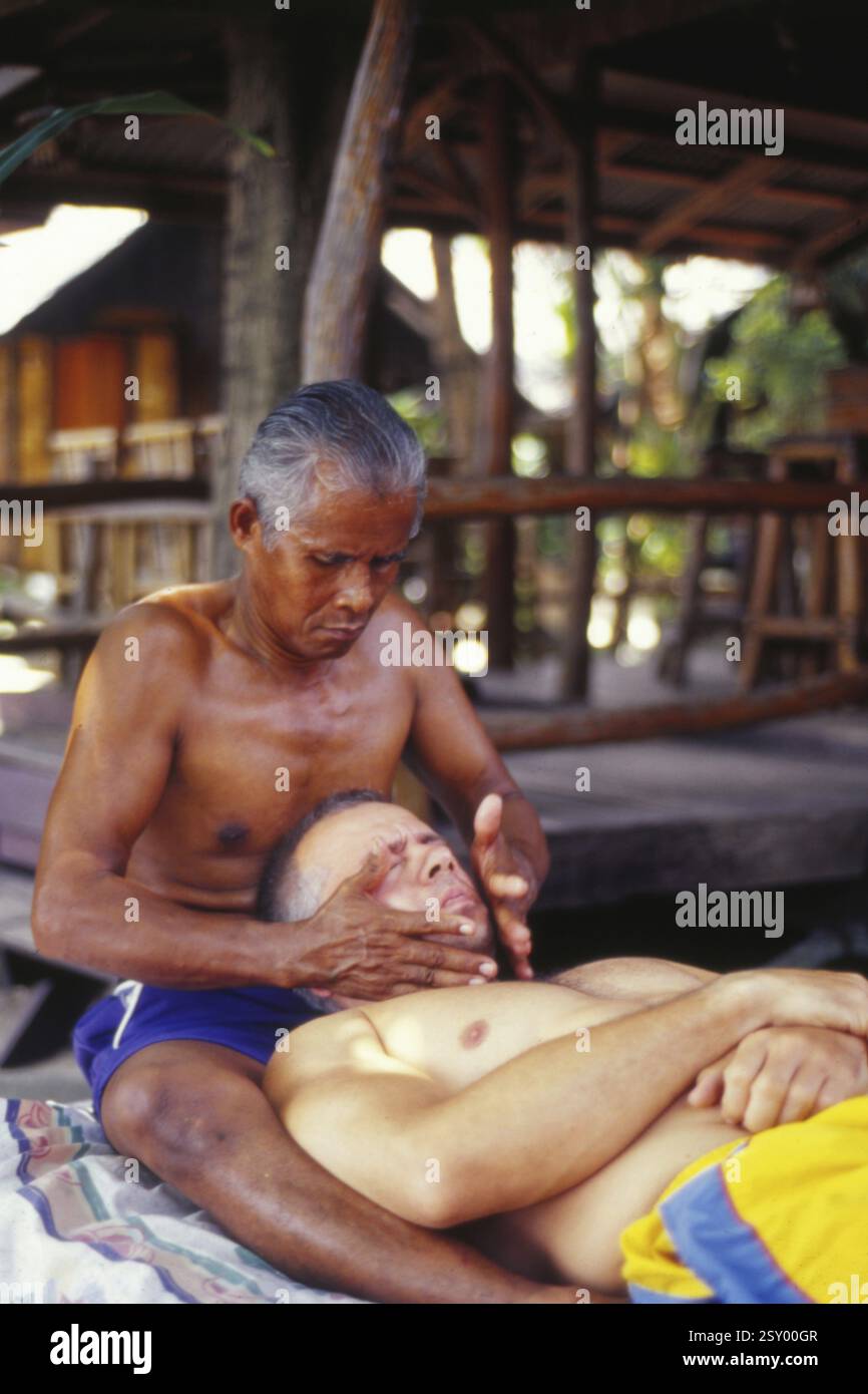 Massage therapist massaging Thailand Stock Photo