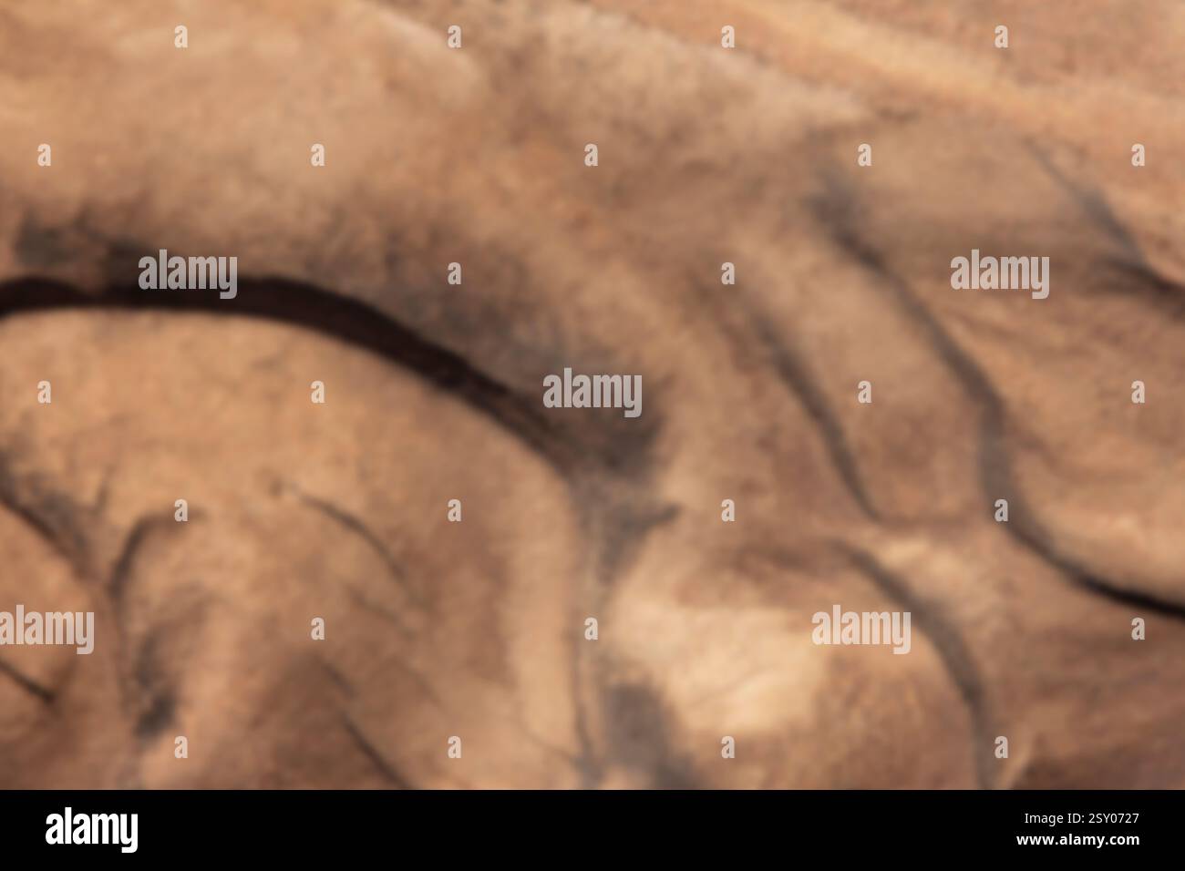 Golden sand texture, blurred background Stock Photo