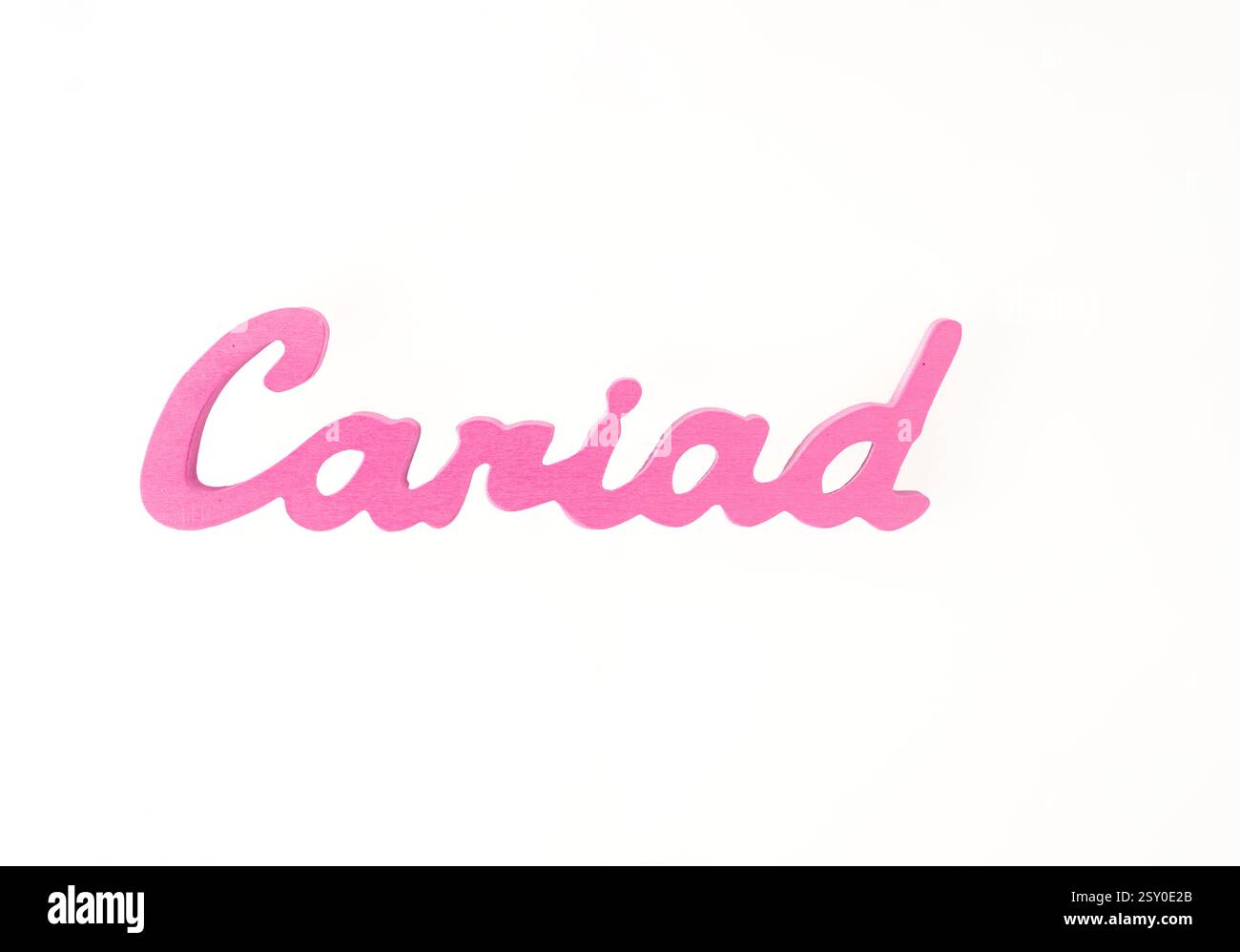Cariad the Welsh word for love painted wooden sign in pink text isolated on a white background with copy space Stock Photo
