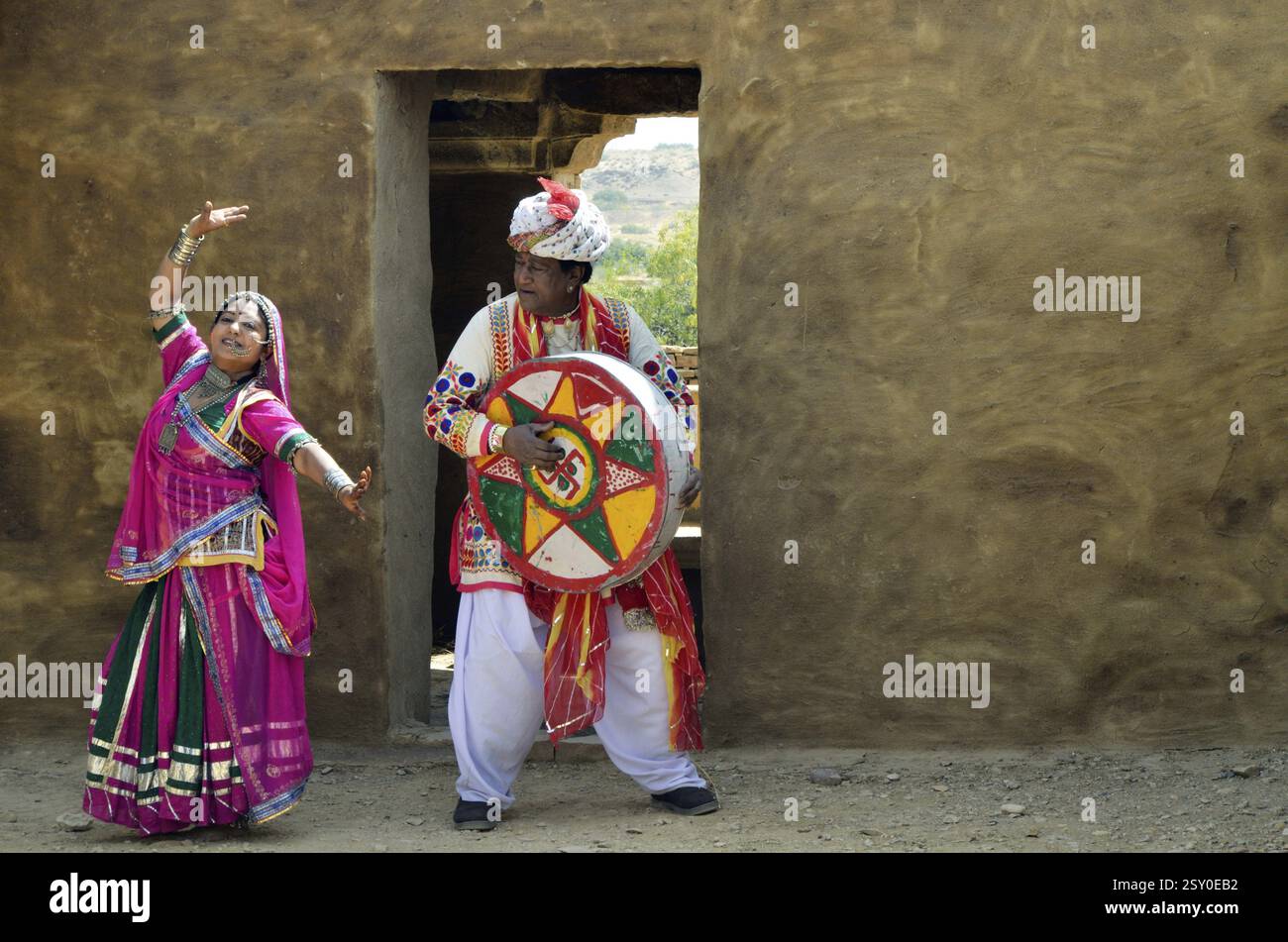 Folk singer with woman performs dance Rajasthan India Asia MR#704I MR#704J Stock Photo