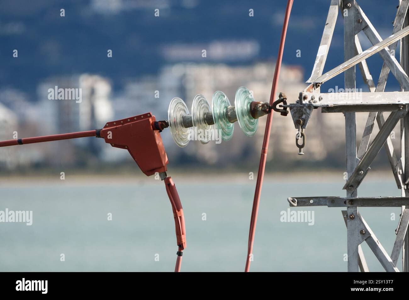 Detail of the insulators of a high voltage tower Stock Photo - Alamy