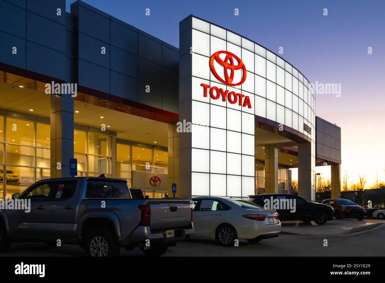nalley-toyota-stonecrest-auto-dealership-showroom-at-dusk-in-metro