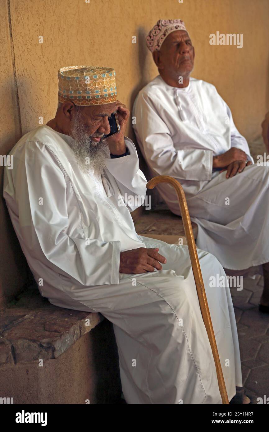 Elderly man walking phone hi-res stock photography and images - Alamy