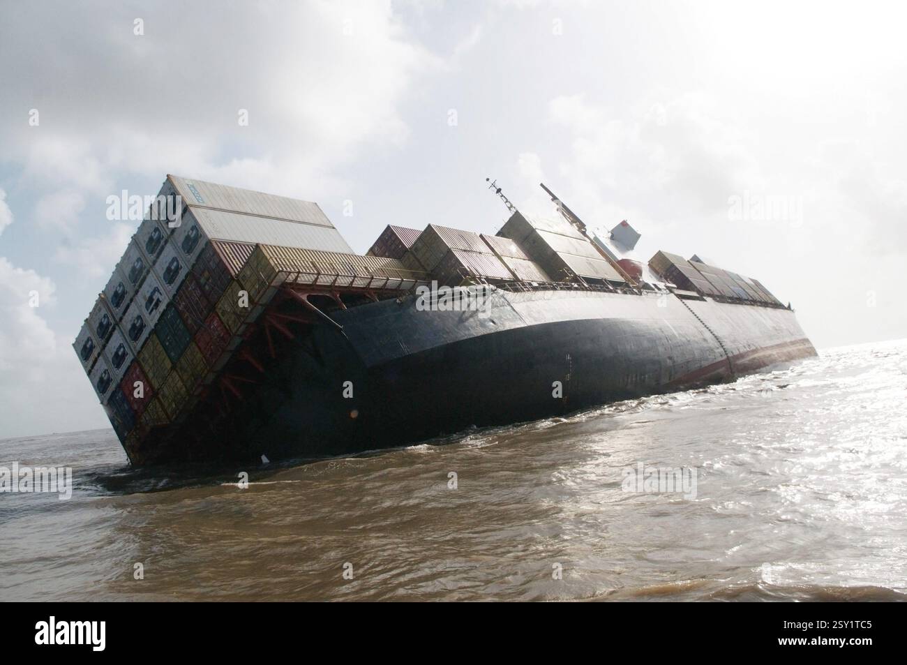 Container ship chitra tilted dangerously colliding in sea, Bombay Mumbai, Maharashtra, India, Asia Stock Photo