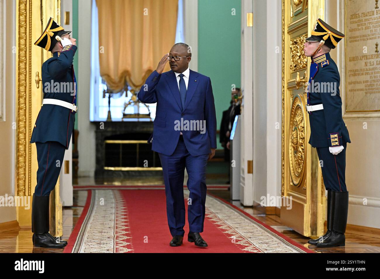 Guinea-Bissau's President Umaro Sissoco Embalo enters a hall during his