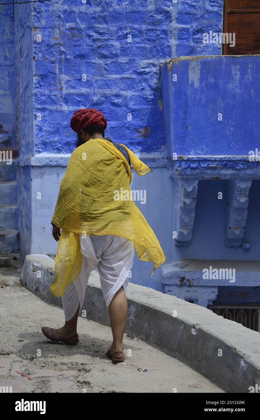 Indian man walking on city hi-res stock photography and images - Alamy
