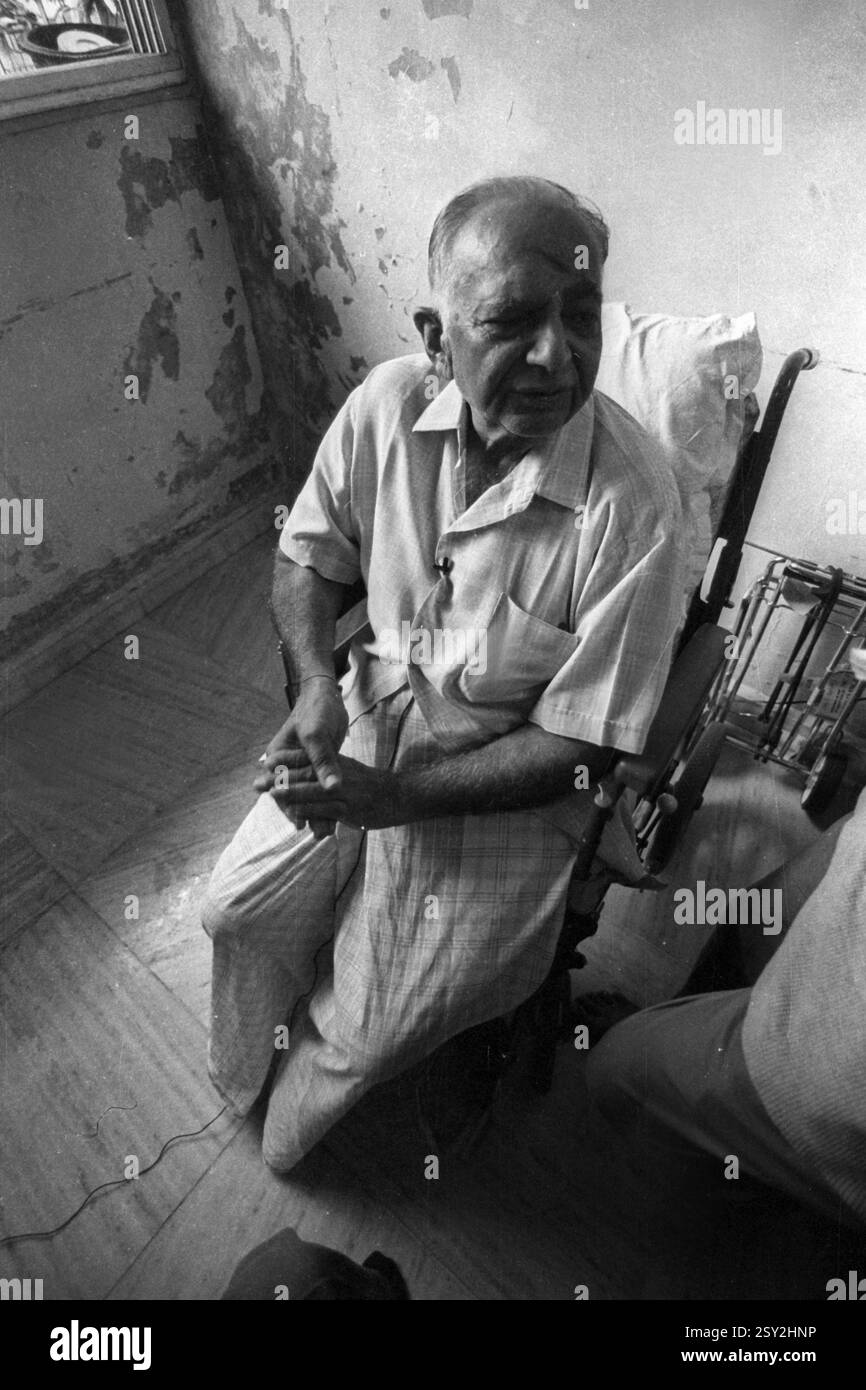 Sitting on the chairs Black and White Stock Photos & Images - Alamy