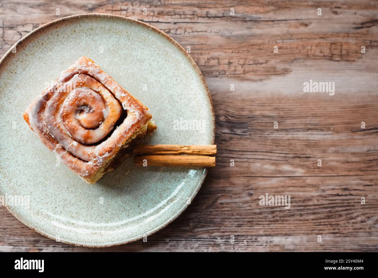 Cinnamon rolls on wooden table, top view, copy space Stock Photo