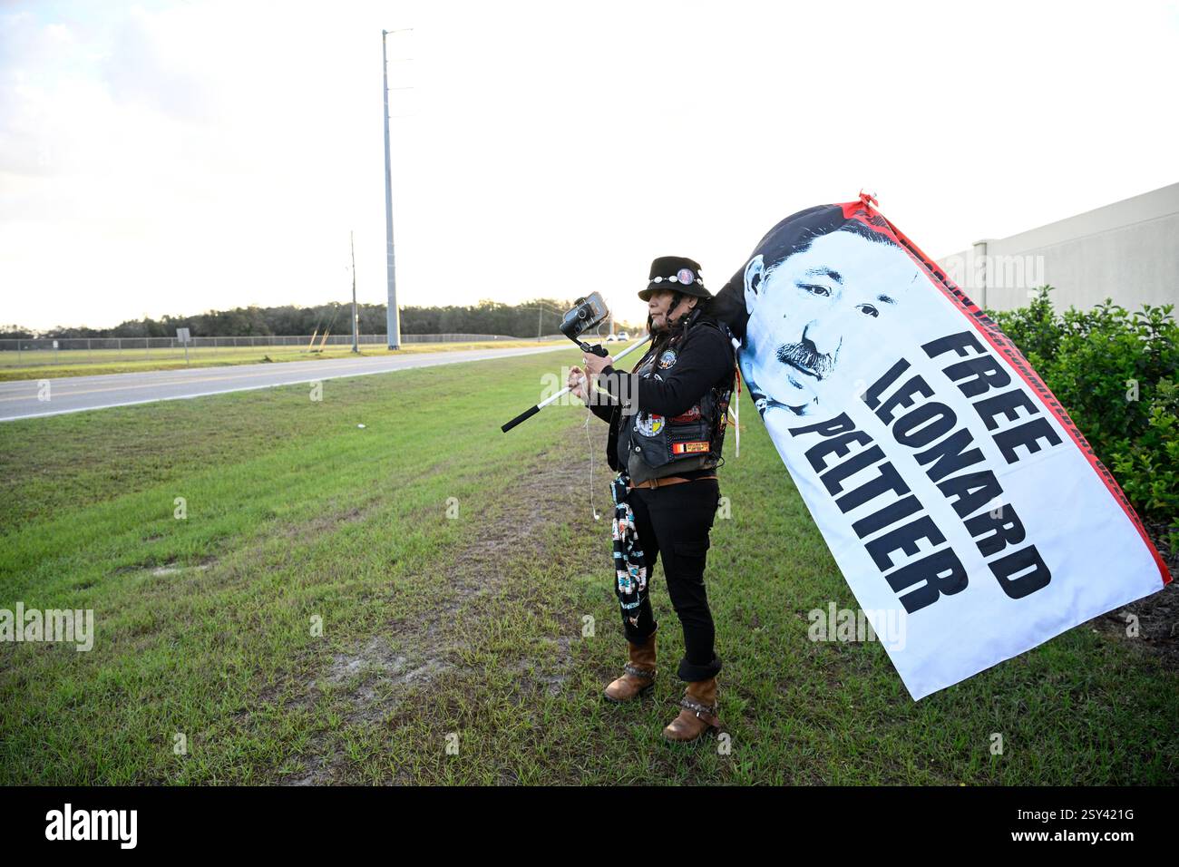 Tracker Gina Marie Rangel Quinones stands in front of Federal ...