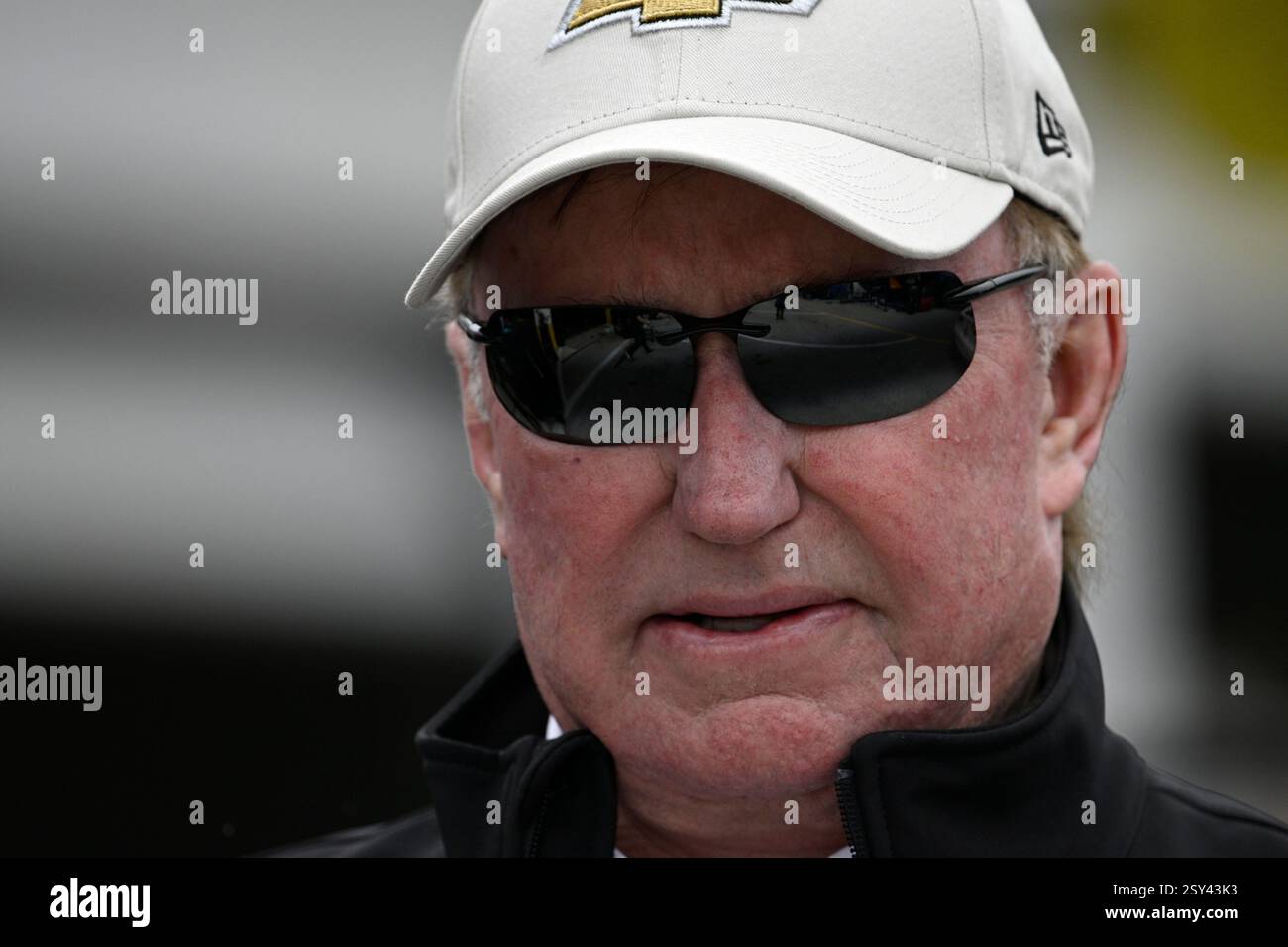 Richard Childress Racing Roster Team owner Richard Childress walks through the garage area before ...