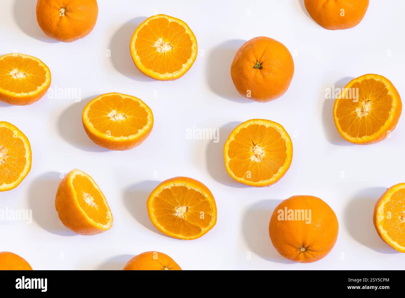 Colorful Oranges Colorful Oranges on white Background, Evoking Warmth and Freshness ...