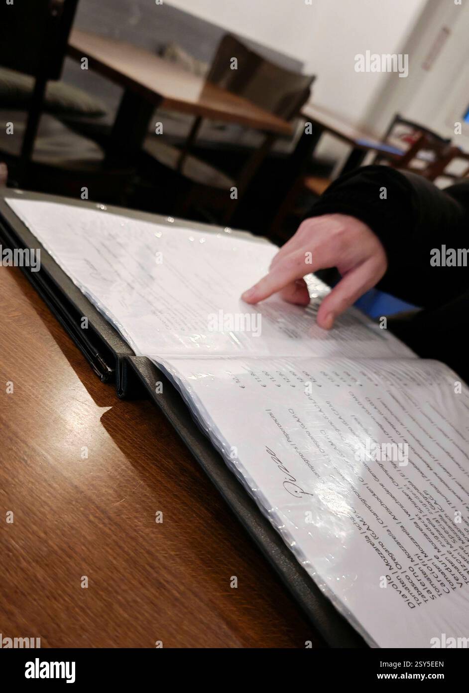 menu in a restaurant listing food and beverages offered to customers ...