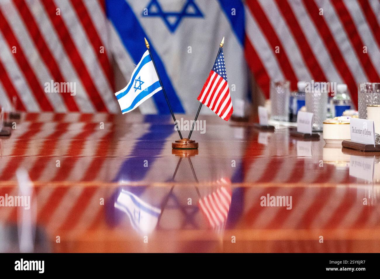 Israel Table FILE - An Israeli and U.S. flag are reflected on a conference table at ...
