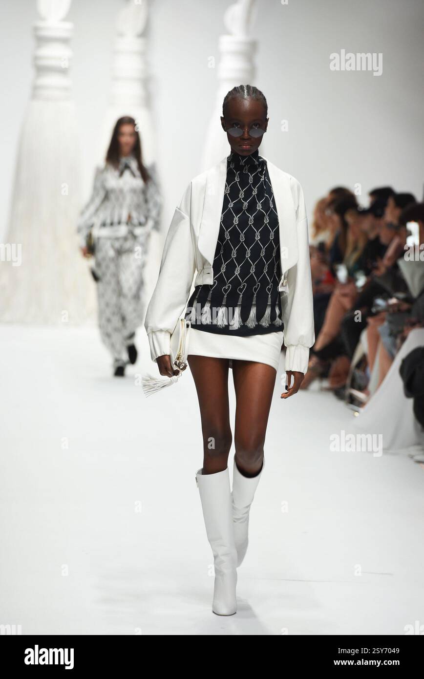 New Italian Model Milan, Italy. 27th Feb, 2025. Models walks the runway at the Genny ...