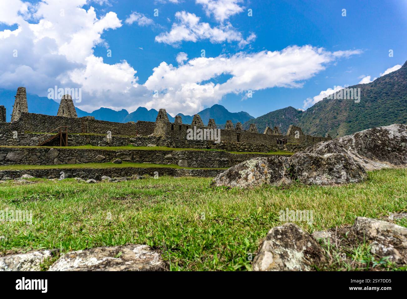 Breathtaking view of Machu Picchu and its ancient Inca ruins nestled among the high peaks of the Andes Mountains in Peru Stock Photo